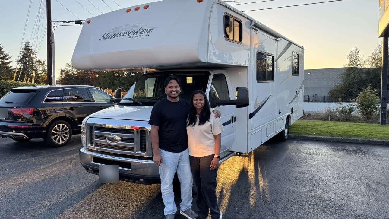 Venu and Supriya with Cherry, their 2013 Sunseeker, on pickup day